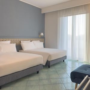 Camera quadrupla in edificio annesso